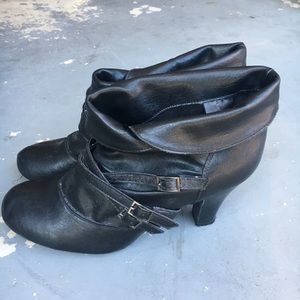 Women’s Black little high heeled boots.